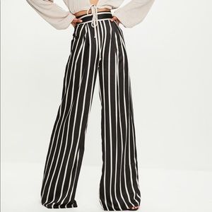 tall black striped wide leg trousers